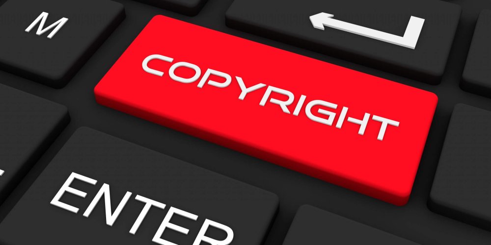 Black keyboard with copyright key, Business, and technology concept background